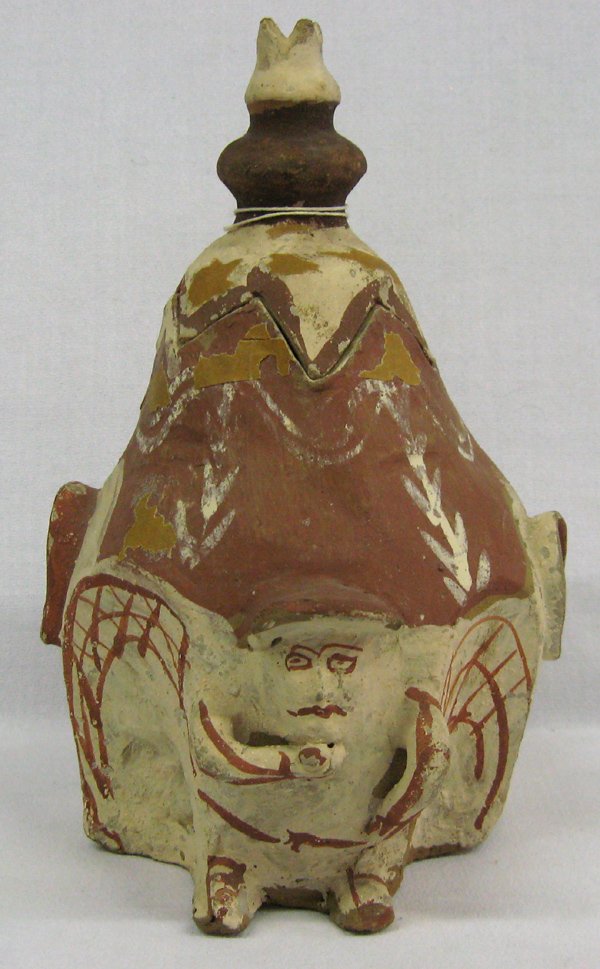 Vintage Peruvian Cucumari Pottery Idol Jar: Vintage Peruvian Cucumari Pottery Idol Jar. The Cucumari is an ancient nature deity, a round vessel with decoration of a face and body on the front and back. Measures 10'' x 7.5''. Informational tag a