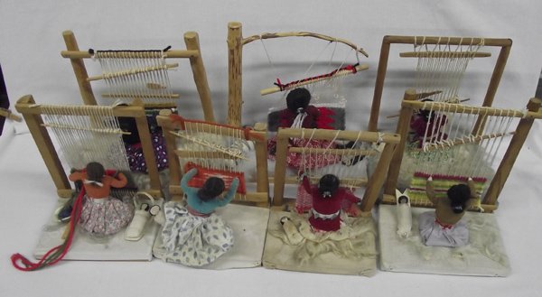 Seven Navajo Weaver Dolls with Looms: Seven Navajo Weaver Dolls. 11''H x 12L'' x 6''W. Handmade dolls with babies showing the skill of Navajo rug weavers.