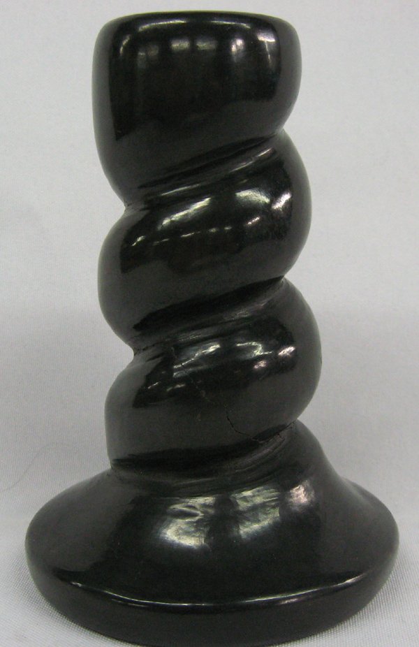 San Ildefonso Candlestick by Carmelita Dunlap: San Ildefonso Candlestick by Carmelita Dunlap. Measures 5.5'' tall, 4'' base. Has pressure crack.