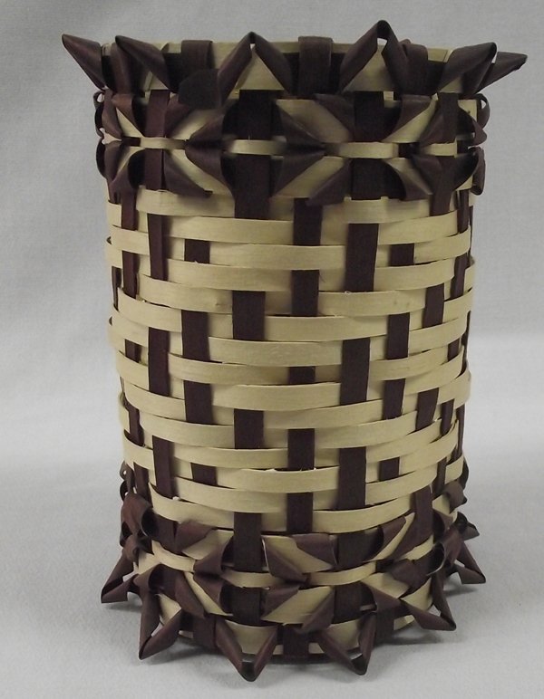 Ash Splint Basket from Minnesota: Ash Splint Basket from Minnesota, measures 5''D x 7''H, brown and tan colored, intricate details, light and dark splints with fancy work