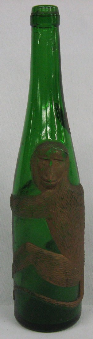 Vintage Adolf Affentaler Achern Baden Wine Bottle: Adolf Affentaler Achern/Baden Wine Green Glass Bottle w/ Monkey, Bottle With Embossed Monkey. Only has small remnant of paper label, Measures 13.5'' tall.