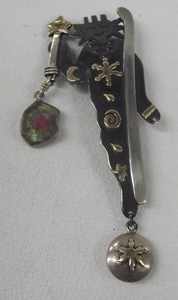 Sterling Shaman Pin Pendant by Richard Lindsay: Sterling Shaman Pin Pendant by Richard Lindsay, measures 3''L, missing one charm, features Shaman figure carrying staff and star wand, adorned with two charms, 14kt gold overlay on sterling silver, ha
