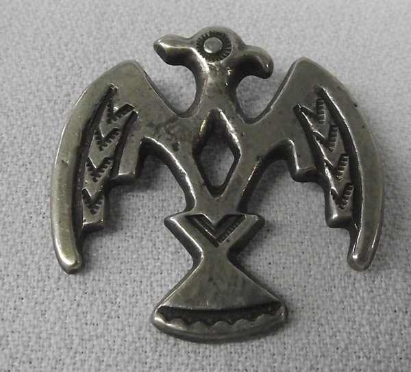 Navajo Silver Sand Cast Thunderbird Pin: Old Navajo Sterling Silver Sand Cast Thunderbird Pin, measures 1.5'' x 1.25'', handstamped