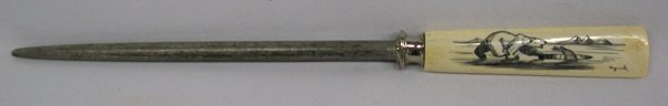 Inuit Knife Sharpener with Scrimshaw Handle by Nuguruk: Northwest Coast Scrimshaw Knife Sharpener by Nuguruk, measures 13''L, beautifully carved tapered handle depicting polar bear trying to hunt a seal as seal as it darts into ice hole
