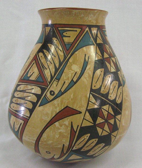 Mata Ortiz Polychrome Stylized Fish Pottery - Rios: Mata Ortiz Polychrome Marbleized Pottery by Lorna Gonzalez Rios x 7.5''H x 7''. Beautiful inside decorative Rim. New Design & Interesting Concept.