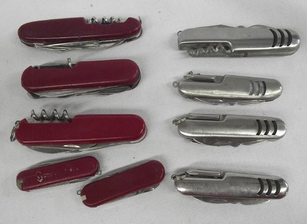 Collection of Nine Camping Knives Some Swiss Army: Collection of Nine Camping Knives Some Swiss Army, 2 small Swiss Army, 3 large Swiss Army, 1 large camping knife marked ''Superior Ornamental Supply Chula Vista 619-423-3703'' and blade marked ''Stain