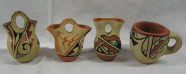 4 Jemez Pueblo Minature Polychrome Pottery: 4 Jemez Pueblo Minature Polychrome Pottery, largest measures 2''H x 3''W. #1 Cup is signed by F.O. Gachupin #2 signed J.M. Jemez #3 signed M.S.T. Jemez #4 C. Chavez Jemez