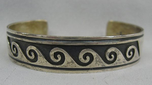 Navajo Sterling Water Wave Bracelet - Gibson Gene: Navajo Sterling Silver Water Wave Bracelet by Gibson Gene, measures 6.25'' inside x .5''W, stamped sterling and hallmarked