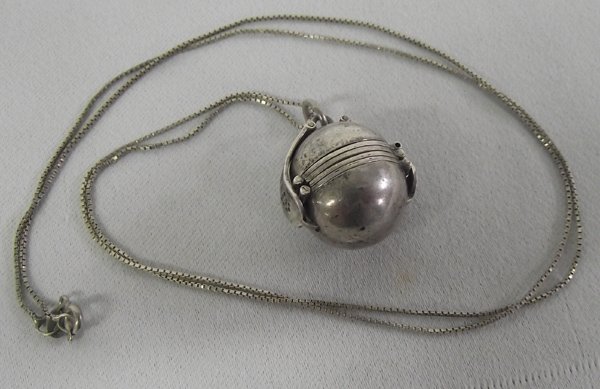 Unusual Taxco TS-79 Sterling Silver Six Picture Locket: Taxco Sterling Silver Ball Locket, 6 Pictures. Locket measures 1'' x 7/8'', open it is 3.5'' long x .75'' wide. Marked ''925'' ''Mexico'' ''TS-79. Sterling snake chain measures 25''.