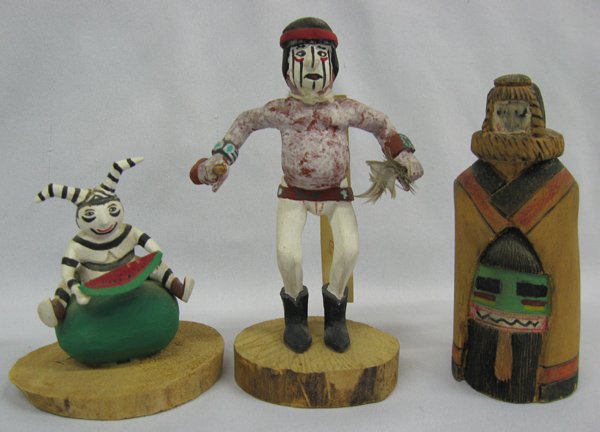 Hopi and Navajo Hand Carved Kachina Dolls: Hopi and Navajo Hand Carved Kachina Dolls, largest measures 4.5''H x 1.75''W, #1 Navajo Koshare Watermelon Clown on wooden base #2 Navajo Koshare Clown Dancer on wooden base #3 Hopi Shalako Kachina by