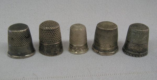 5 Antique Sterling Silver Thimbles: 5 Antique Sterling Silver Thimbles, largest measures .75''D x .75''H, #1 Engraved flowers and birds, stamped sterling and engraved Ann, #2 stamped 426 sterling, #3 stamped flower 8TS sterling, #4 not 