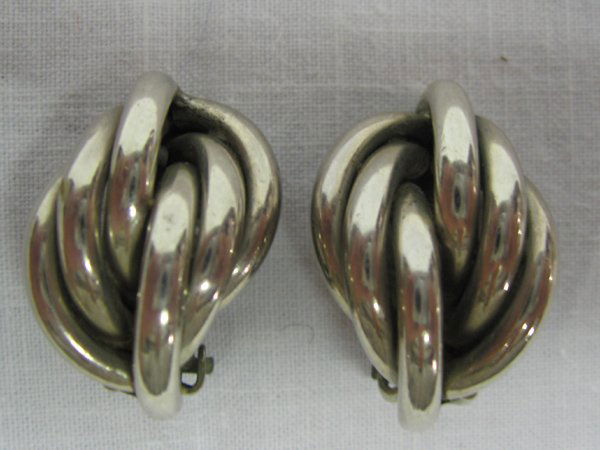 Mexican Sterling Silver Clip on Earrings by Jondell: Sterling Silver Clip-On Earrings, Mexico, Signed by Jondell. Measures 1'' x 3/4''. Signed ''925'' ''Mexico'' ''Jondell''.