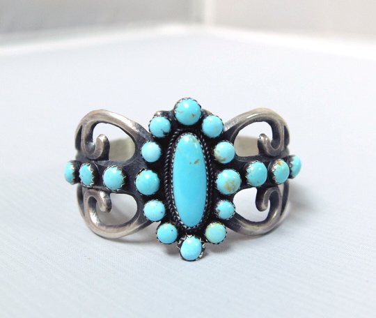 Navajo Sterling Turquoise Bracelet - Albert Brown: Navajo Sterling Turquoise Bracelet - Albert James Brown, inside measures 6.75'' which includes opening x 1.5''W, absolutely stunning revival brushed silver bracelet embellished with 18 small robin blu