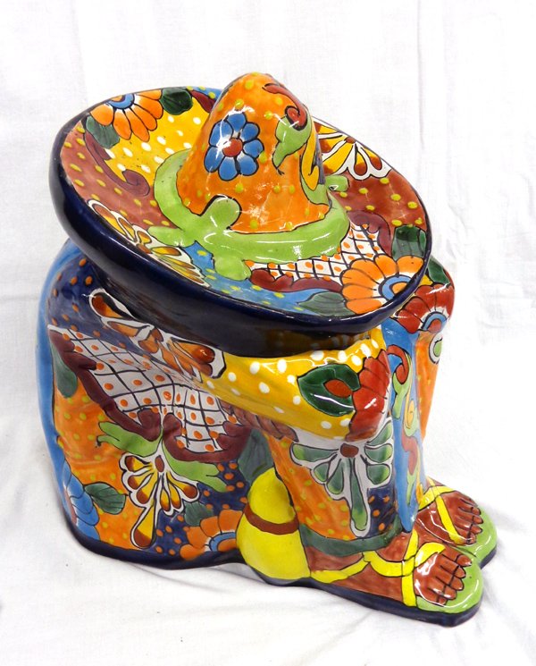 Mexican Talavera Style Pottery Siesta Man: Mexican Talavera Style Pottery Siesta Man, measures 14.5''H x 14''L x 10''W, brightly painted, marked Mex.