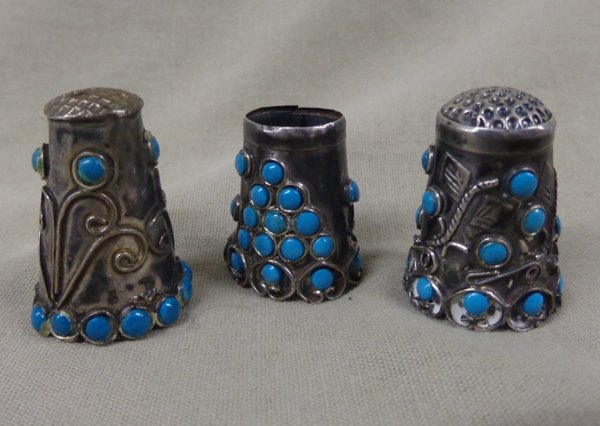 Antique Navajo Turquoise Thimbles: Antique Navajo Turquoise Thimbles, largest measures .75''D x 1.25''H, one of the thimbles is missing the top, 1 is missing stones
