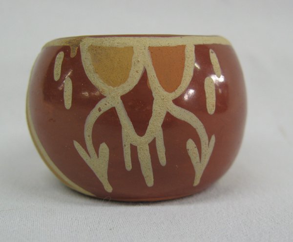 Santa Clara Miniature Polychrome Jar by Mary Cain: Santa Clara Miniature Polychrome Jar by Mary, possibly an early Mary Cain (1916-2010) piece, signed Mary S.C., measures 1.5''H x 2''W, features rain clouds, minor paint loss on rim, sweet piece