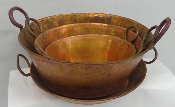 Vintage Hand Hammered Copper Pots & Pans: Vintage Hand Hammered Copper Pots & Pans. Largest piece is 12'' in diameter and includes 2 other nested pots. The shallow pan measures 11'' in diameter.