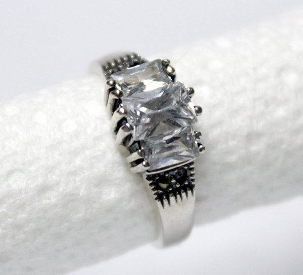 Sterling Silver Marcasite and White Topaz Ring: Dazzling Sterling Silver Marcasite and White Topaz Ring, size 6.5 and measures .25''L