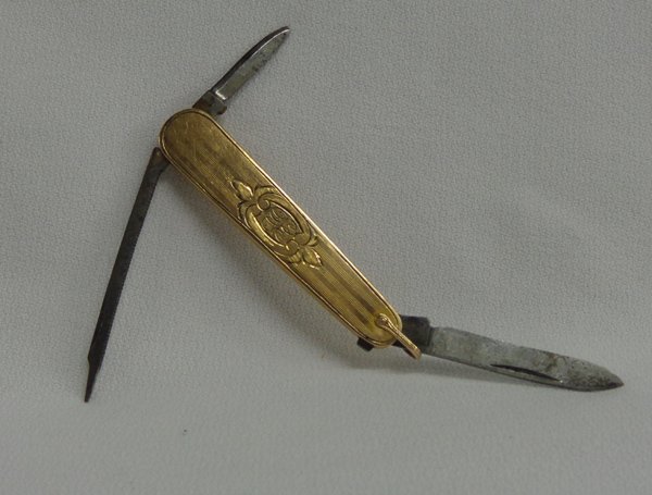 Vintage Miller Pocket Knife, 10k Gold Top: Vintage Miller Pocket Knife, 10k Gold Top. Marked on blade ''Miller BFCS USA'' and marking on the ring ''14k TOP''. Measures 2 3/4'' x 1/2'' wide. Bright work cartouche engraving with monogram which l