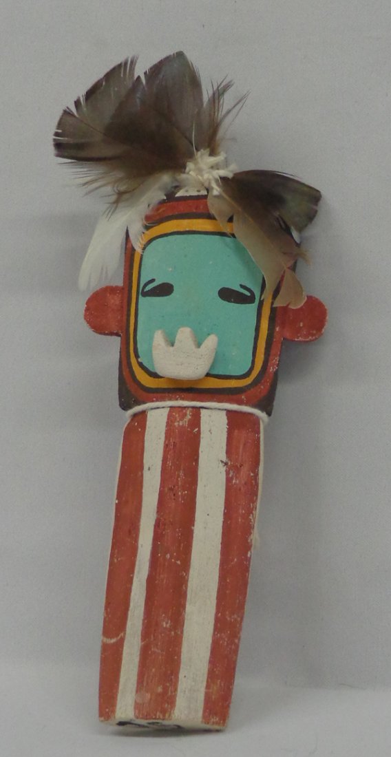 Hopi Cradle Board Kachina: Hopi Cradle Board Kachina. Painted and decorated in the traditional style of the Hopis, the piece measures 7.5'' high, 4'' wide (not including feathers).