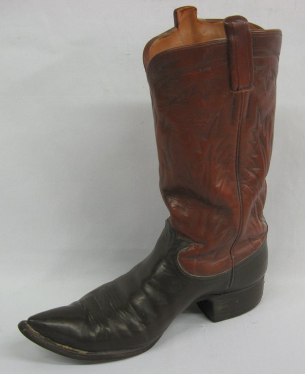 Ceramic Two-Toned Cowboy Boot Vase: Ceramic Two-Toned Cowboy Boot Vase. Beautiful piece of pottery, modeled and colored with such accuracy it appears to be a real boot! Measures 12'' high and 11'' from toe to heel.