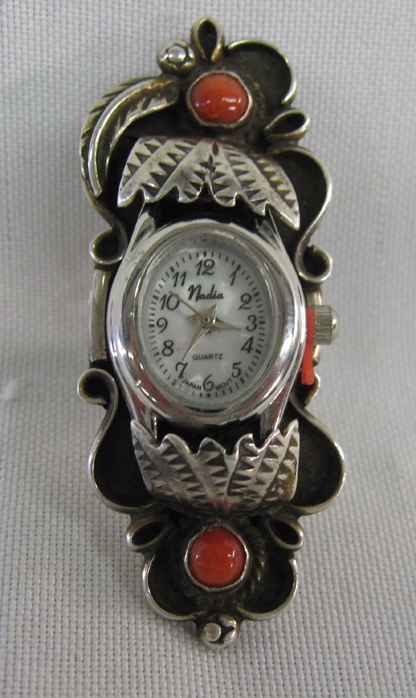 Navajo Sterling Silver & Coral Watch Ring, Size 8.25: Navajo Sterling Silver & Coral Watch Ring, Size 8.25. Coral, all set in a shadow box design, double shank, size 8.25. Watch is new, quartz.