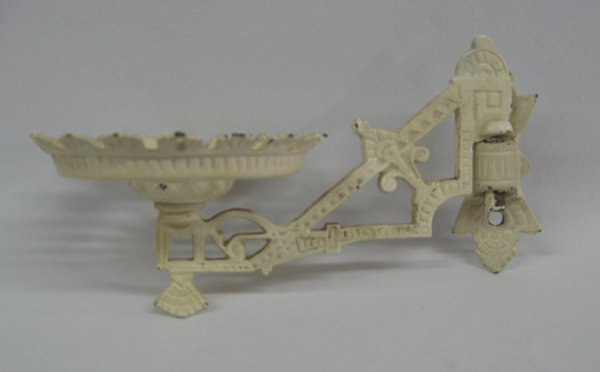 Victorian Cast Iron Plant Hanger Wall Bracket: Victorian Cast Iron Plant Hanger Wall Bracket. Unusual small size, measuring 4'' high x 8'' wide. Complete with wall mounting bracket. Eastlake Victorian motif.