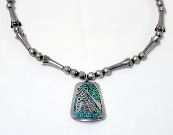Navajo Sterling Turquoise Chip Inlay Choker: From the Tucson, Arizona Collection. Navajo Sterling Turquoise Chip Inlay Choker, measures 14.25'' end to end, pendant measures 1.5''L x 1''W, hallmarked BD, what's unique about this piece is that the