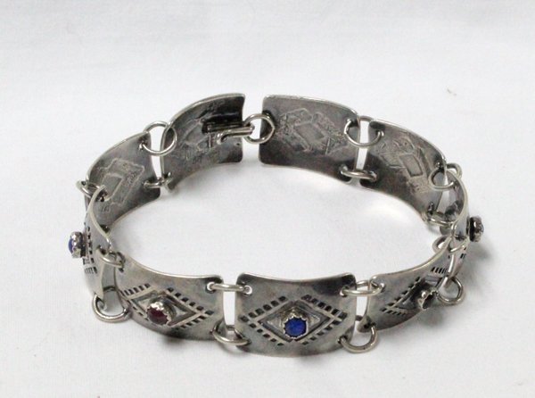 Navajo Sterling Silver & Gemstone Link Bracelet: From the Tucson, Arizona Collection. Navajo Sterling Silver & Gemstone Link Bracelet, measures 7.5'' end to end x 5/8''W, 20.4g in wt, stones included are garnet, sodalite, and lapis