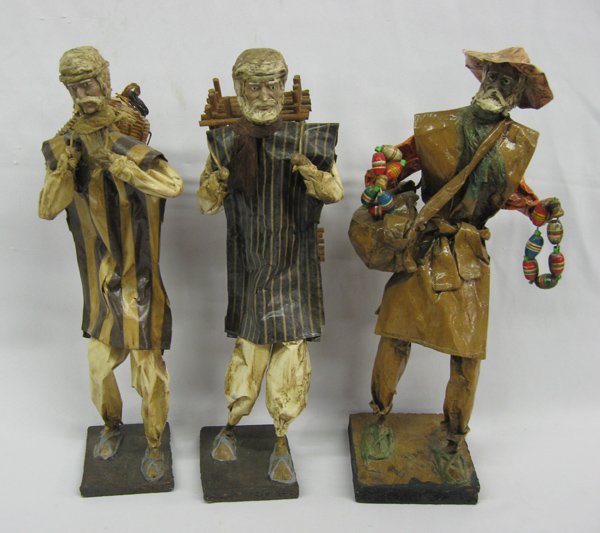 3 Mexican Folk Art Paper Mache Peasant Dolls: Three Papier Mache Mexican Peasant Figures. Great detail in these typical Mexican crafted figures, in native dress and selling their wares at market. Measures 14''.