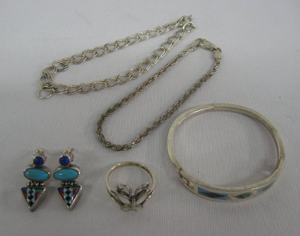Collection of Sterling Silver Jewelry: Collection of Sterling Silver Jewelry, 29.2g in wt, sterling chain bracelet measures 7''L, collection includes 2 chain bracelets, 1 butterfly ring, 1 pr earrings, and one bangle, each piece is stamped