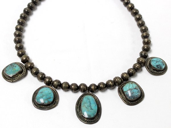 Navajo Old Pawn Coin Silver Turquoise Choker: Navajo Old Pawn Coin Silver Turquoise Choker, measures 16.5'' end to end, longest drop measures 1 5/8''L x 7/8''W, features hollow silver beads, 5 oval drops embellished with bezel set turquoise caboc