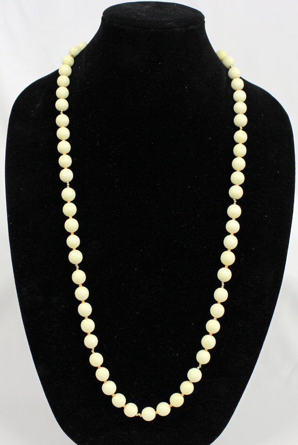 14Kt Gold, Ivory and Angel Coral Bead Necklace: 14Kt Gold, Ivory and Angel Coral Bead Necklace, measures 36'' end to end, features 60 Ivory beads measuring .5''D accented with angel coral and gold beads, Custom made by Ivory Carver Earl Mann, Inter