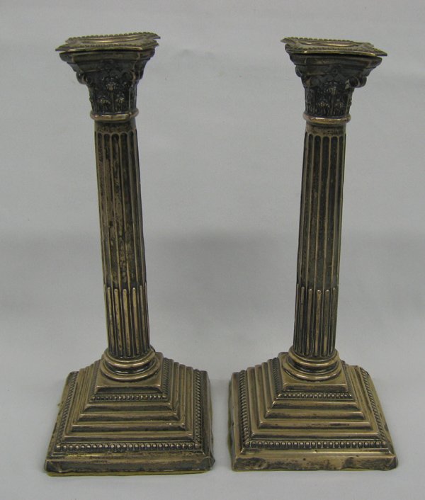 Pair British Sterling Corinthian Candlesticks: Pair British Sterling Corinthian Candlesticks. Pair of Corinthian column candlesticks by S. G. Jacobs of Birmingham, England, dated 1919. They bear the hallmarks of the ''anchor, lion passant and 'U''
