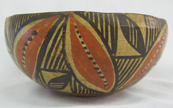Historic 1920's Zia Polychrome Bowl: 1920's Isleta/Zia Polychrome Bowl, measures 7''D x 3.25''W, the chip in the rim does not detract from the beauty of this pottery bowl, exquisite geometric and abstract designs. Bowl has shellac added