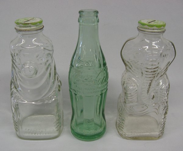 1950's Coca-Cola Bottle and 2 Grapette Bottles: 1950's Coca-Cola Bottle Deming NM and 2 Grapette Bottles, tallest is the Coke bottle measuring 8''H x 2''D and the bottom is embossed Deming N.M., Elephant and Clown Grapette Bottles, bottom is emboss