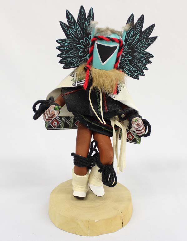 Hopi Crow Mother Kachina: Hopi Crow Mother Kachina measures 11'' x 5'', bottom reads ''Angwusnasomtaka Crow Mother SG'', embellished with yarn, rabbit fur, felt, leather, and feathers