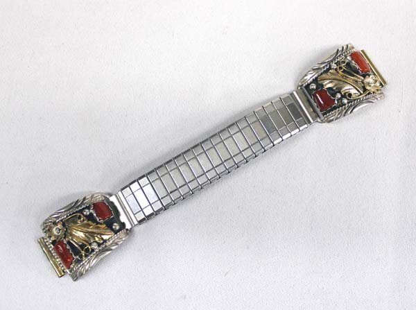 Navajo Silver Gold Filled Watch Band by E Cowboy: Navajo Sterling Gold Filled Coral Watch Band by Ella Cowboy, measrues 5 5/8'' pin to pin, stamped GF (Gold Filled), Sterling, and hallmarked E, very traditional Navajo setting featuring 4 coral caboch