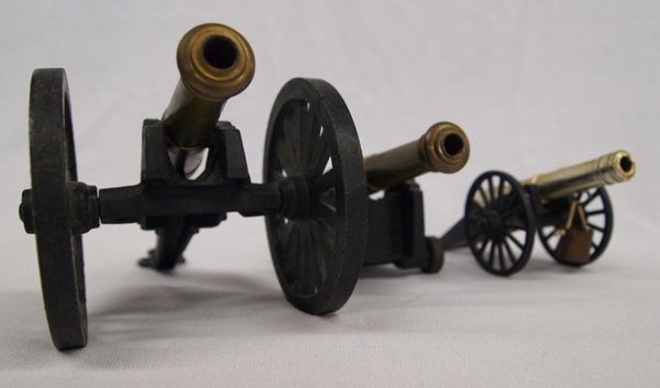 3 Brass and Cast Metal Miniature Cannons: 3 Brass and Cast Metal Miniature Cannons, largest measures 7.5''L x 3.5''W, #1 Civil War Cannon Replica is marked MF Co. C 1/3 #2 Old Vtg Collectible GP 382 Military Cannon Made In Italy, comes with A