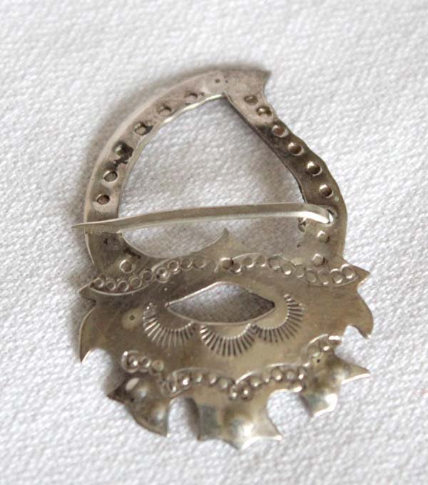 Sterling Early European Trade Item Pin Replica: Sterling Early European Trade Item Pin Replica by Colleen & Tom Kozlowski, measures 1.5'' x 1'', hand stamped details, unusual pin closure, center of this pin is heart shaped, this is a replica from E