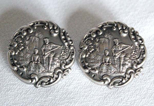 Antique English Silver Repousse' Earrings: Antique English Silver Repousse' Earrings, clutch post pierced, earrings depict young man playing a lute for his lady, measures 1''D, stamped L&S for Levi & Salaman -Phineas Harris Levi & Joseph Wolfe