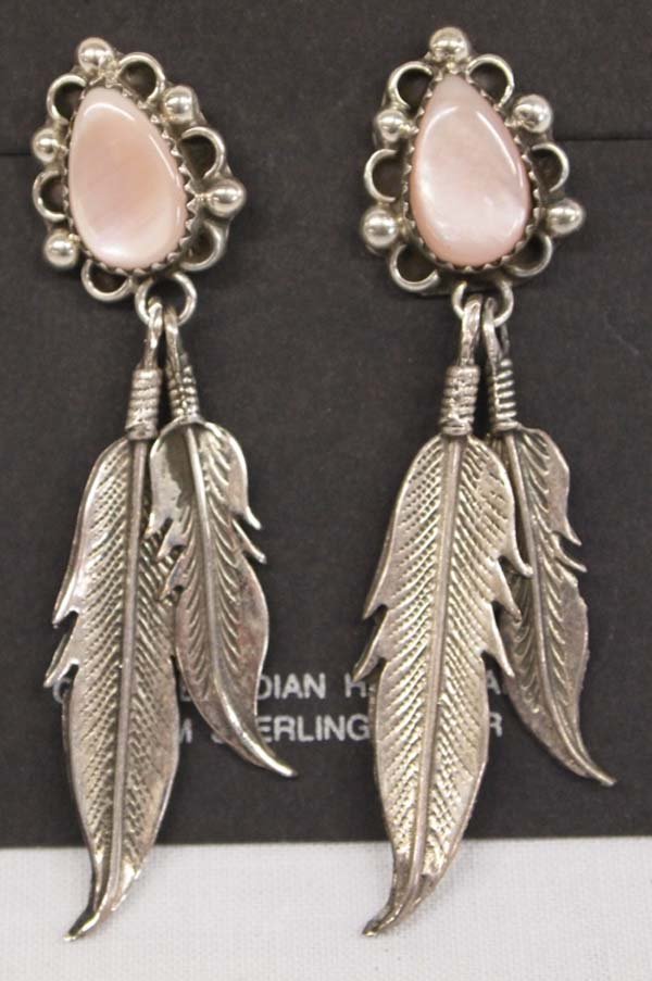 Navajo Sterling Pink Mother of Pearl Earrings: Navajo Sterling Pink Mother of Pearl Earrings, measures 2.5''L x .5''W, features traditional style setting, sterling feather dangles, teardrop shaped pink mother of pearl cabochons measuring .5'' x .2