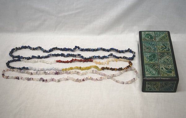 Oninala Mexico Incised Lacquered Box + Necklaces: Oninala Mexico Incised Lacquered Hinged Box + Necklaces, box measures 8''L x 3.75''W x 2.5''H, included are 3 stone chip necklaces ranging in length from 30-34'', stones are Fluorite, Sodalite, and Mi