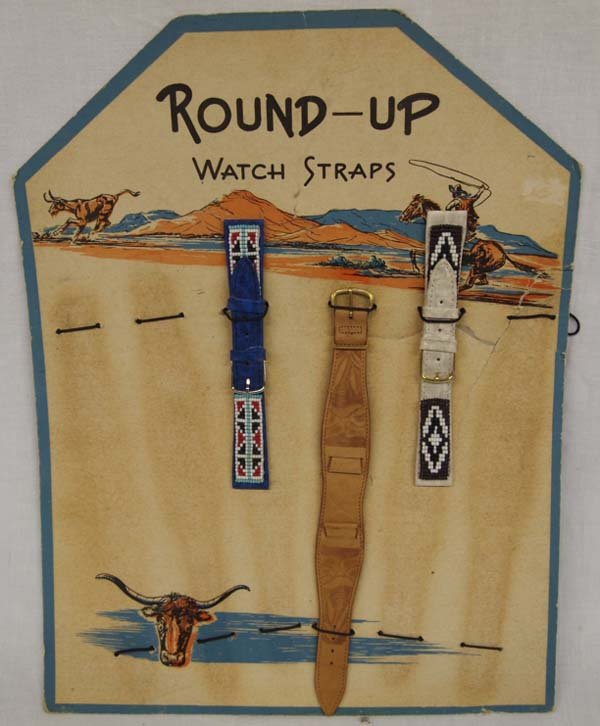 1950's Round Up Watch Strap Display Board: 1950's Round Up Watch Strap Display Board. Includes 2 beaded on leather straps and one tooled leather strap. Longest is the leather band measuring 8.5"L x 1"W.
