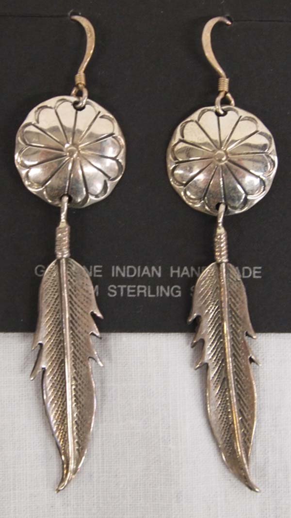 Navajo Sterling Feather Dangle Earrings - Becenti: Navajo Sterling Feather Dangle Earrings - Robert Becenti, hallmarked RB and stamped sterling, each earring features a hand stamped flower design with one sterling feather dangle, measure 2.5'' x 5/8''