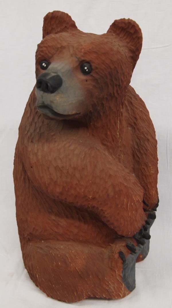 Navajo Carved Wood Folk Art Bear - R. and H. Juan: Navajo Carved Wood Folk Art Bear - Rena and Harrison Juan, measures 16''H x 9'' x 9'', signed on bottom by artist, has crack running from left ear down through chest to in between paws. Rena Juan is k
