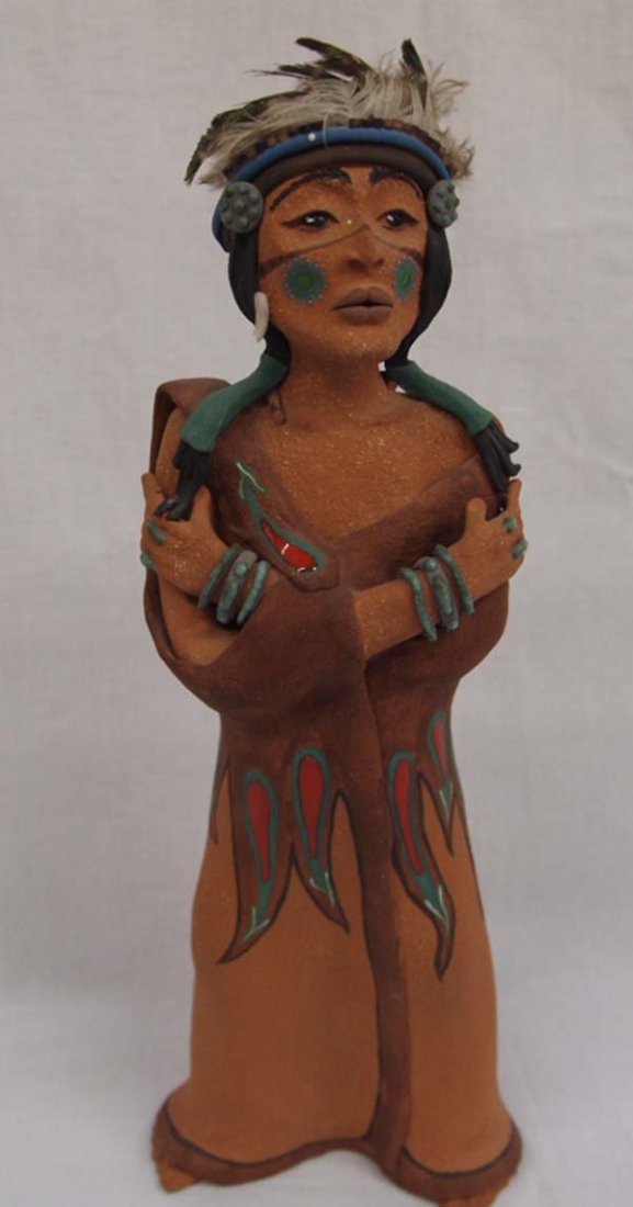 Mexican Mayan Indian Maiden Slab Pottery Figurine: Mexican Mayan Indian Maiden Slab Pottery Figurine, has feather headdress. Maiden measures approx. 13''H x 5''W.