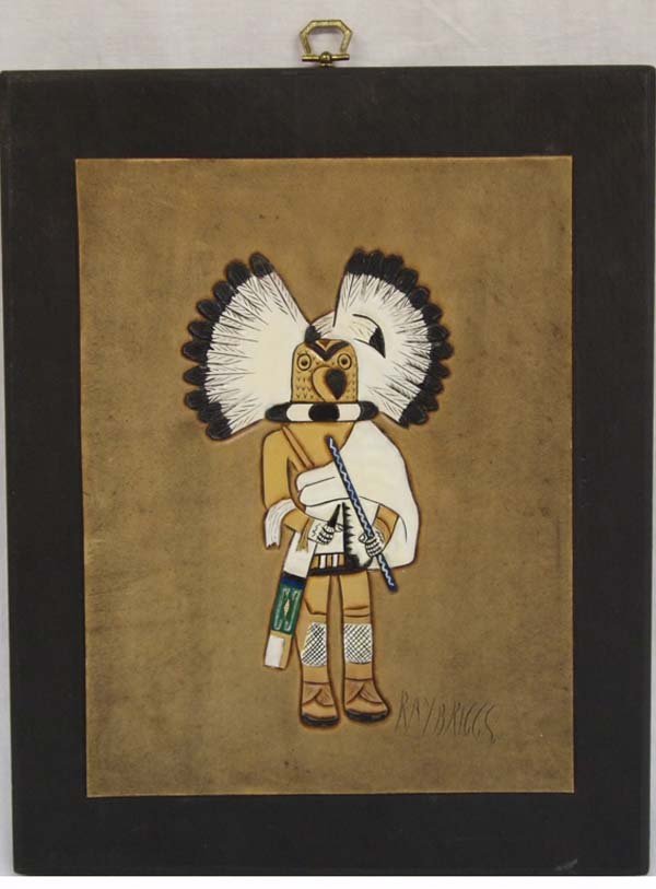 Hopi Tooled Leather Art by Ray Briggs: Hopi Tooled Leather Art Mounted on Board by Ray Briggs. Titled ''Mongwa'' and depicting, in stiking detail, the Great Horned Owl, This piece measures approx. 8.5'' x 11''.