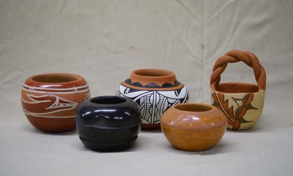 Collection of 5 New Mexico Pueblo Pottery Jars: Collection of 5 New Mexico Pueblo Pottery Jars, largest measures 4.75''H x 3'', #1 Jemez Polychrome Pottery Basket by F.C. Gachupin #2 Jemez Polychrome Jar by R. Toya #3 Santa Clara Stylized Feather J