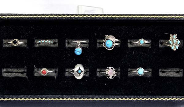 8 Navajo Sterling Rings & 2 Zuni Sterling Rings: Total of 10 Rings to include: 8 Navajo Rings sizes 2-6. 3-7, 4-8, & 1-9. The Zuni Needle Point is size 6 & the Zuni Petit Point is size 7. Total gram weight is 14.7